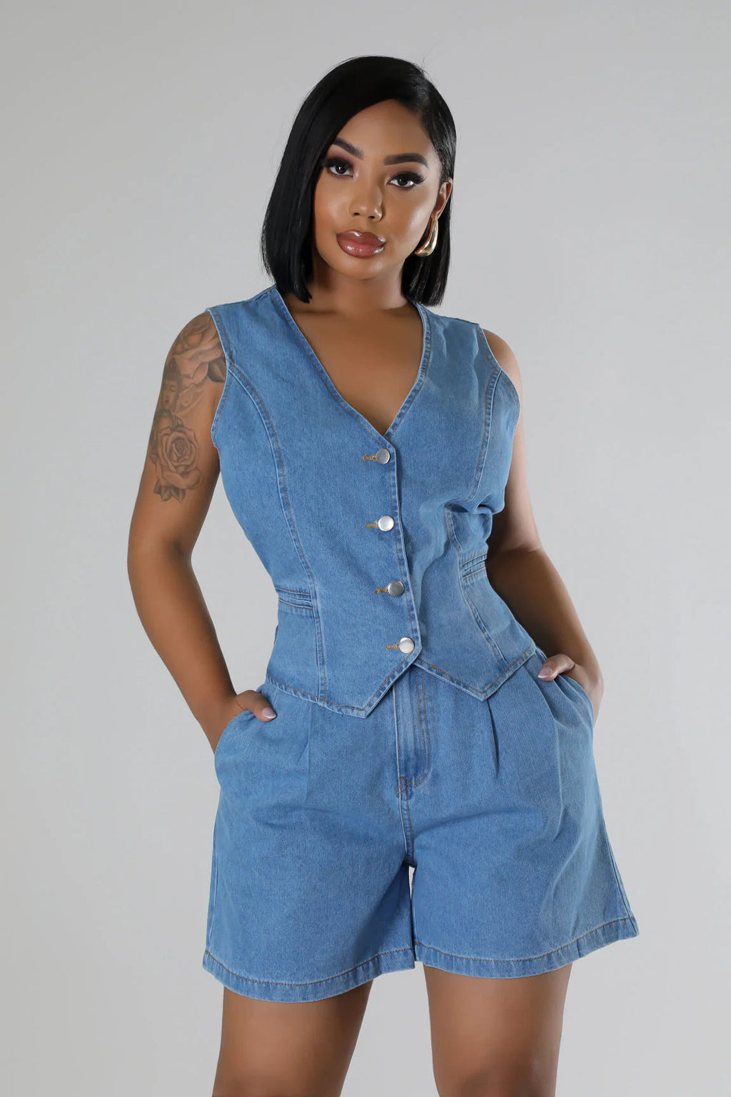 Short denim shorts with no sleeves and a high waist