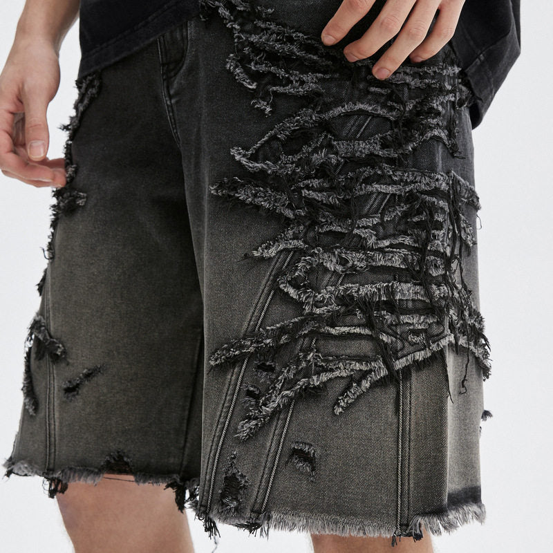 Distressed denim shorts