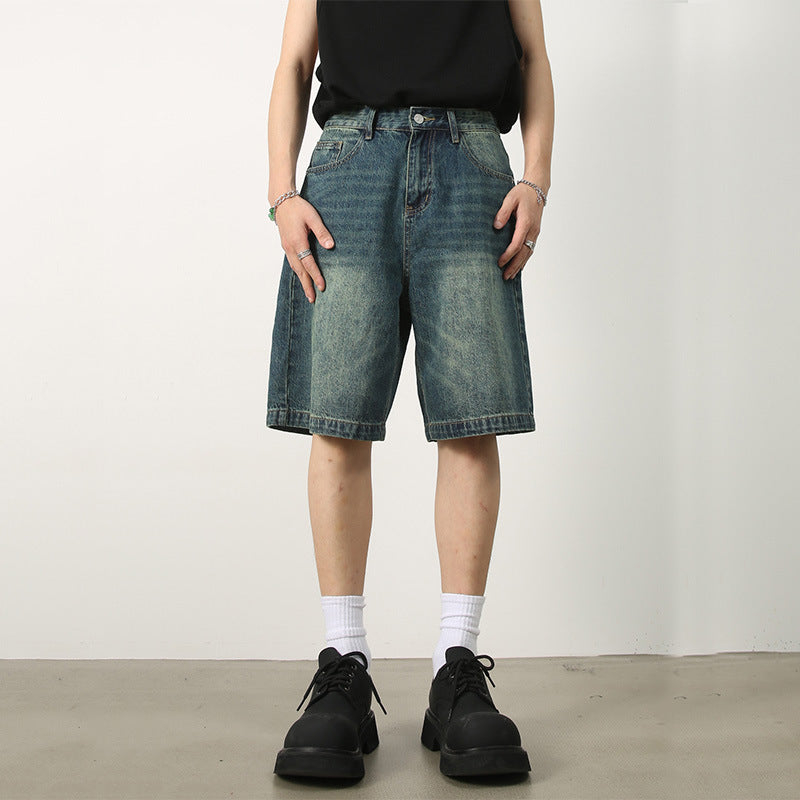 Distressed blue denim shorts