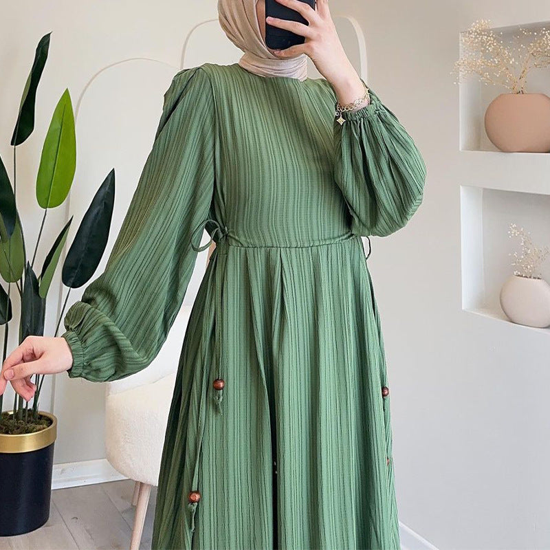 Round-necked long robe with frilled sleeves