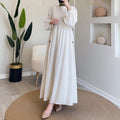 Round-necked long robe with frilled sleeves
