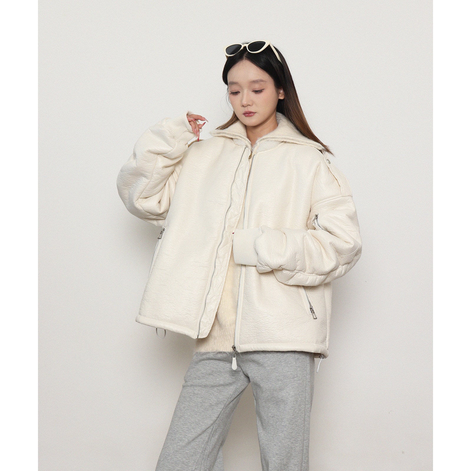 Loose, gender-neutral, warm padded jacket with zipper