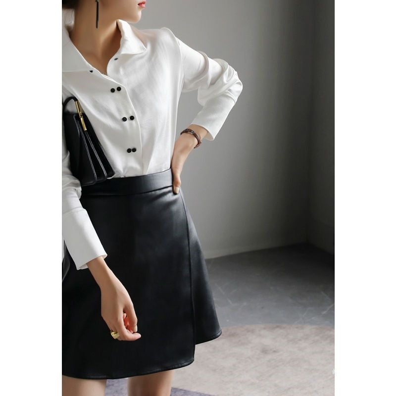 High-waisted leather lettered short skirt