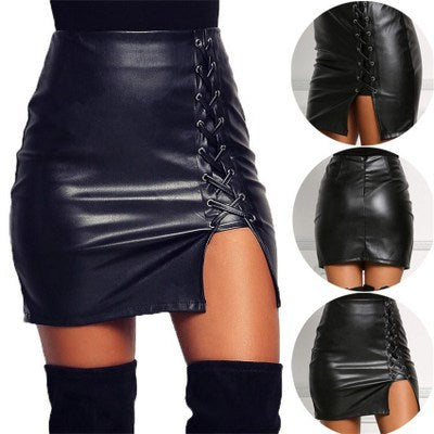 Black strapped, figure-hugging, slit leather skirt