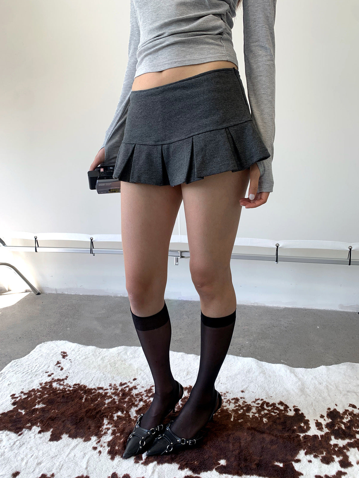 A uniquely designed, high-waisted, slimming midi skirt for women.