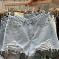 Women's fringed denim shorts