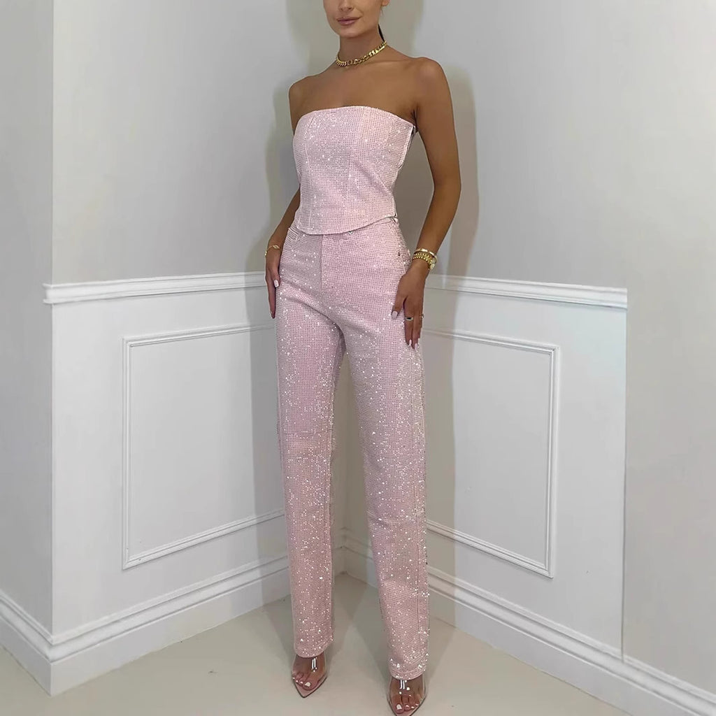 Off-the-shoulder shiny vest and diamond trousers