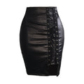 Black strapped, figure-hugging, slit leather skirt