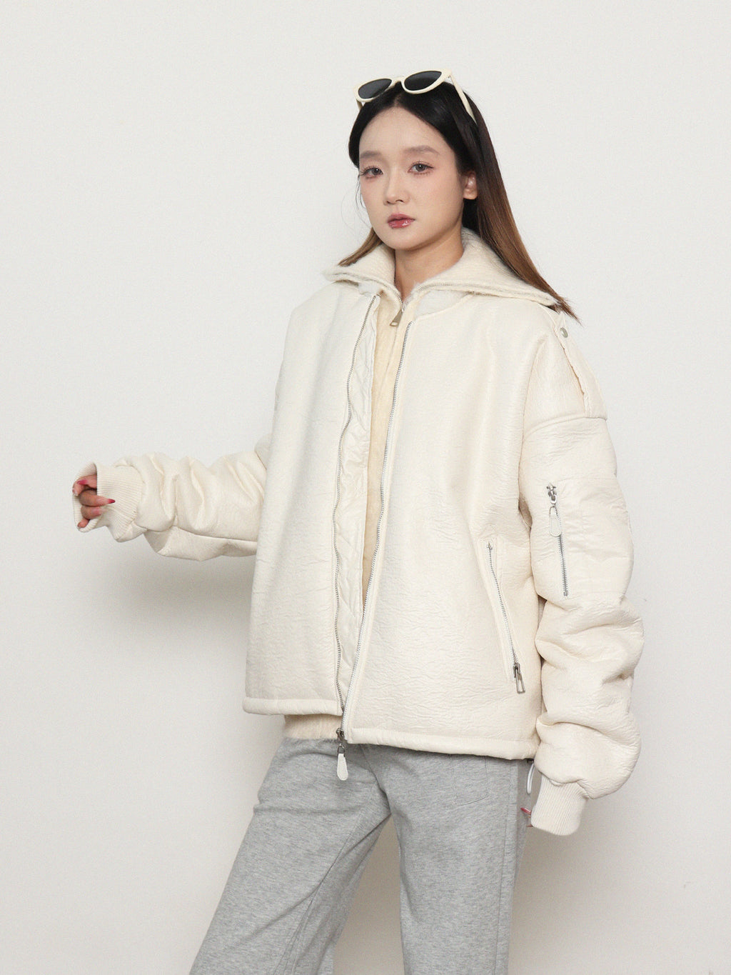 Loose, gender-neutral, warm padded jacket with zipper