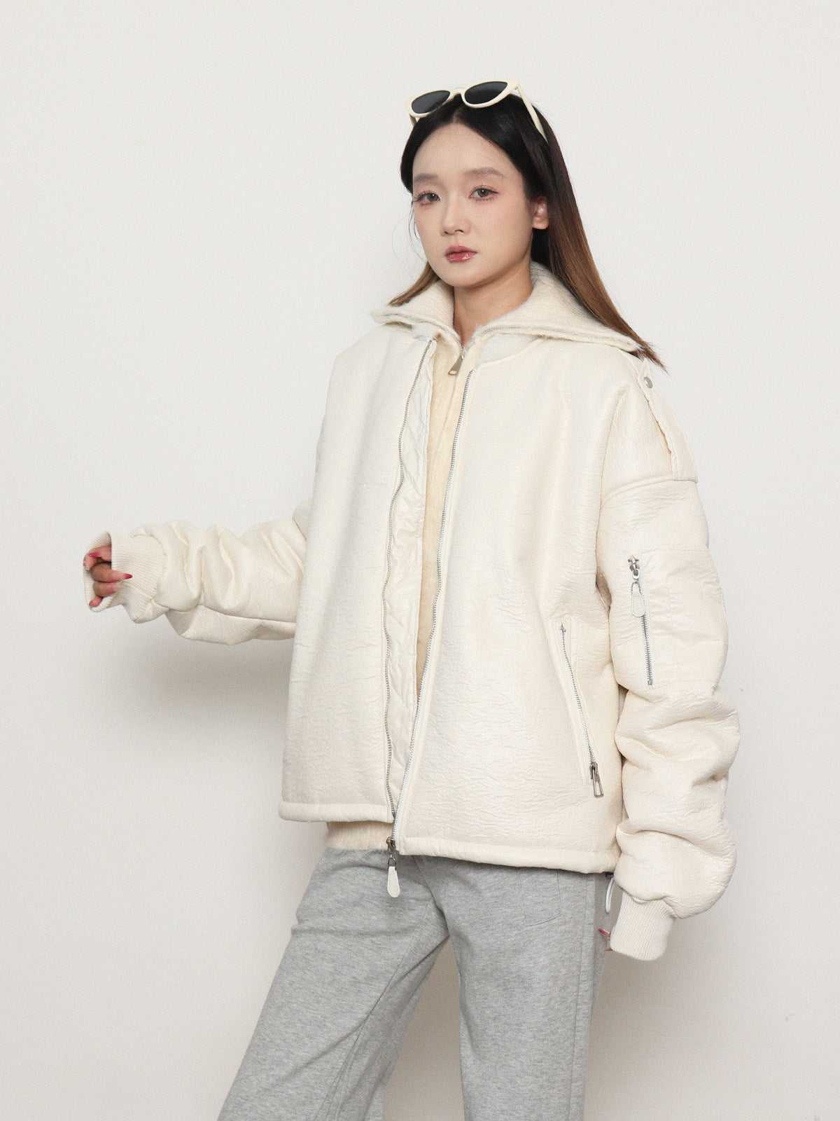 Loose, gender-neutral, warm padded jacket with zipper