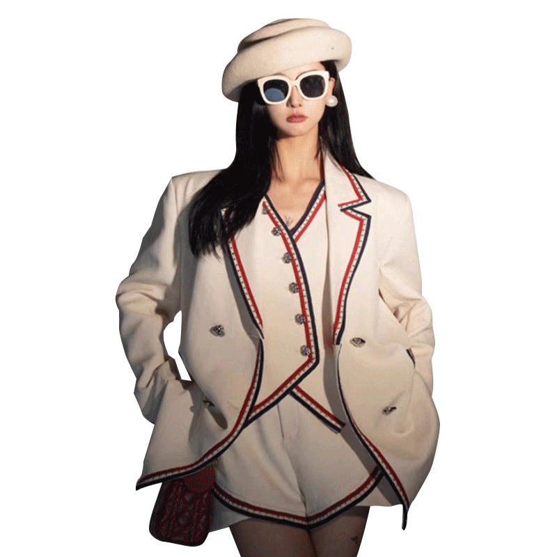 White beaded suit vest and trousers