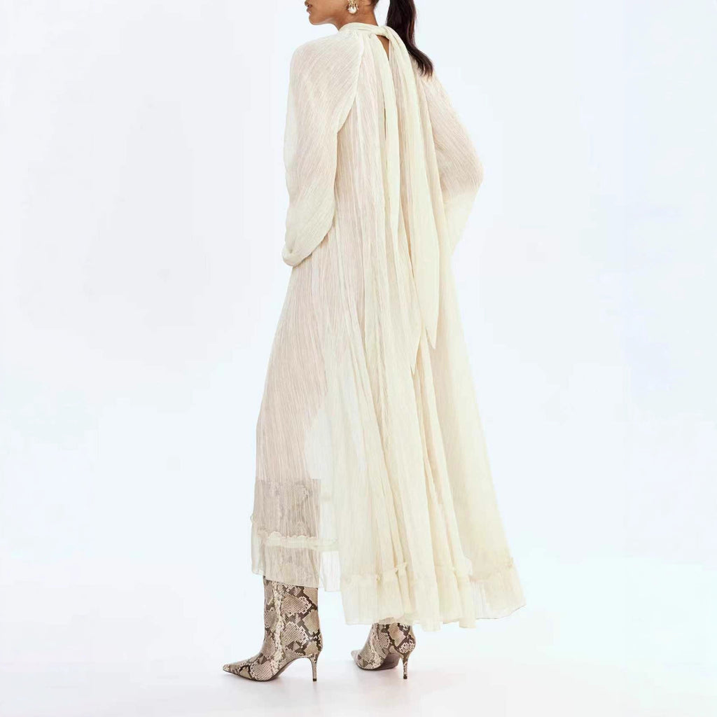 Solid-color dress with long sleeves