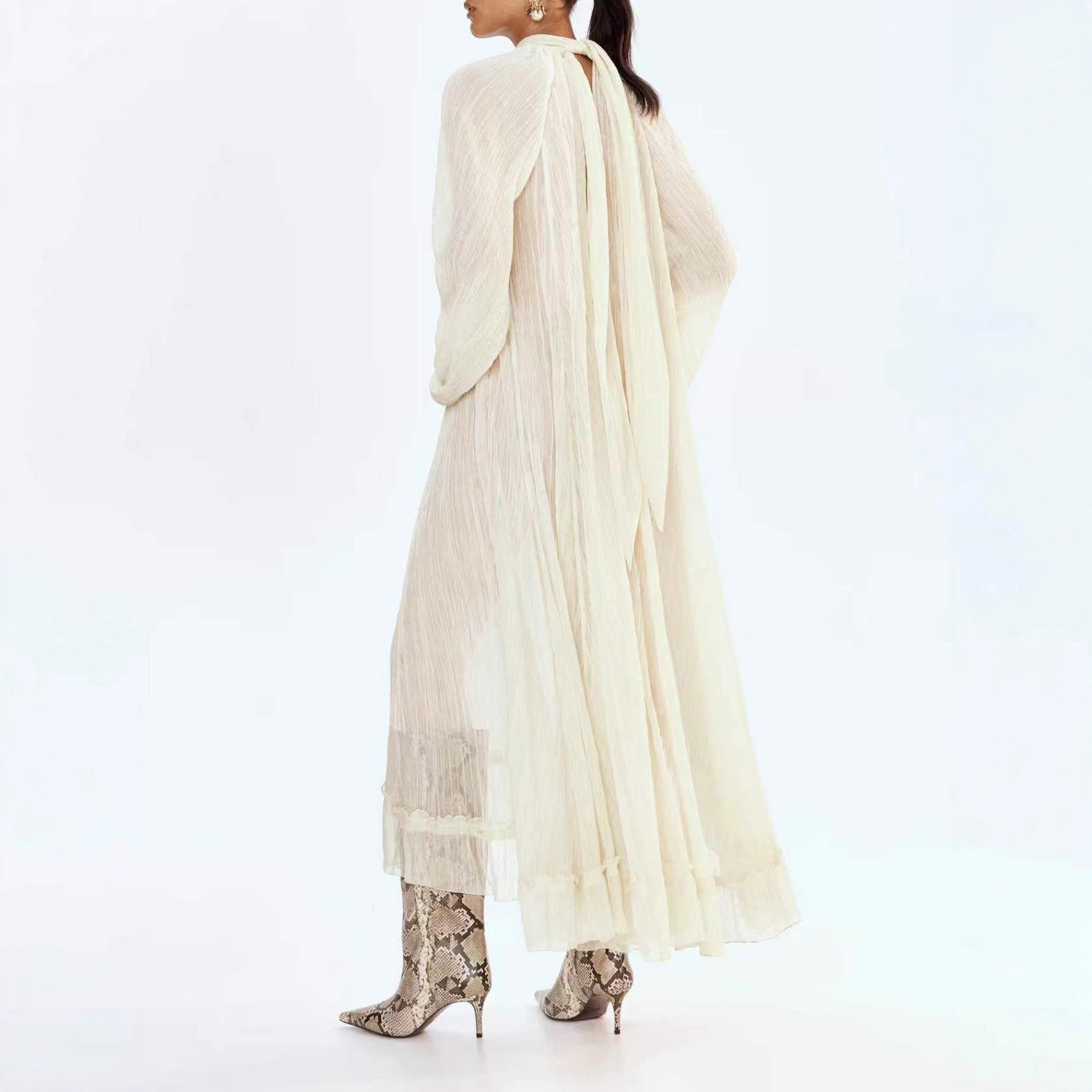 Solid-color dress with long sleeves