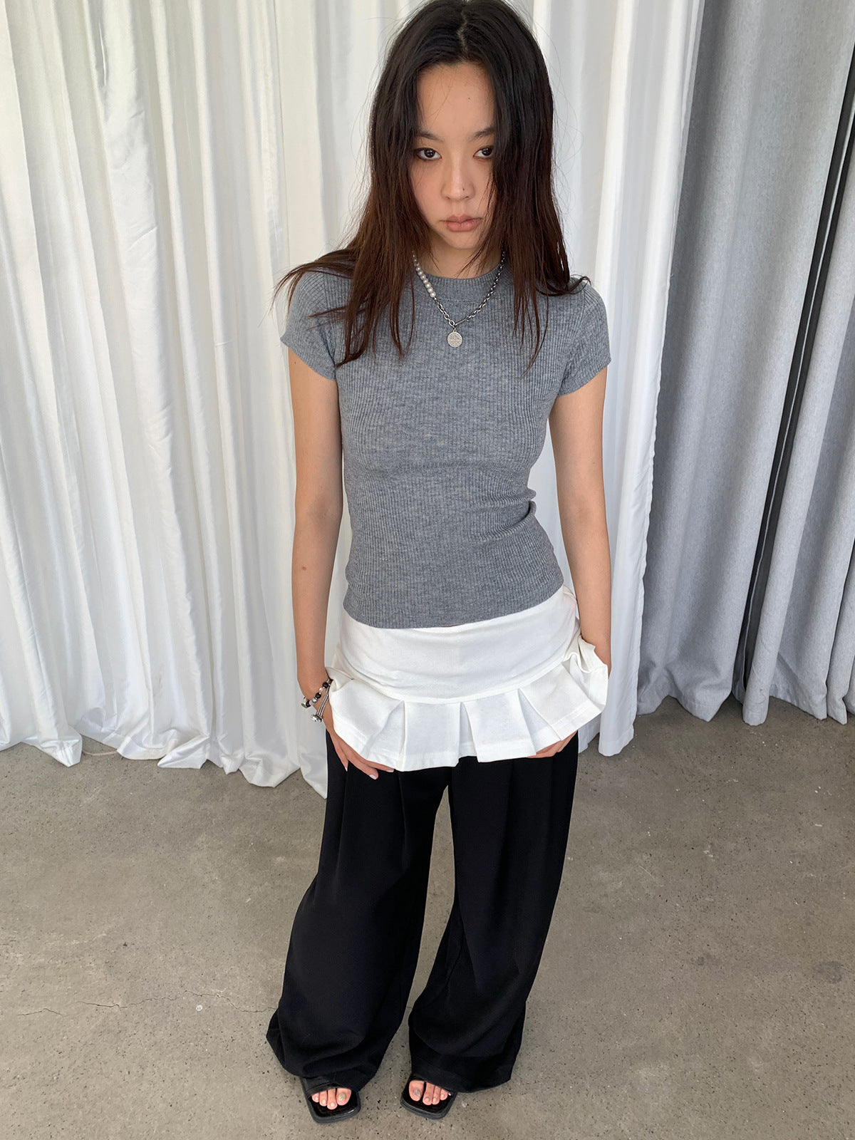 A uniquely designed, high-waisted, slimming midi skirt for women.
