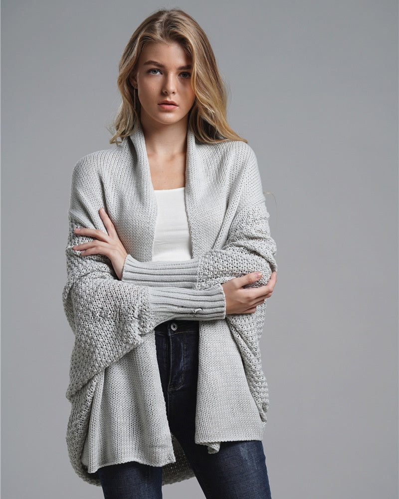 Long and oversized knitted cardigan in large size