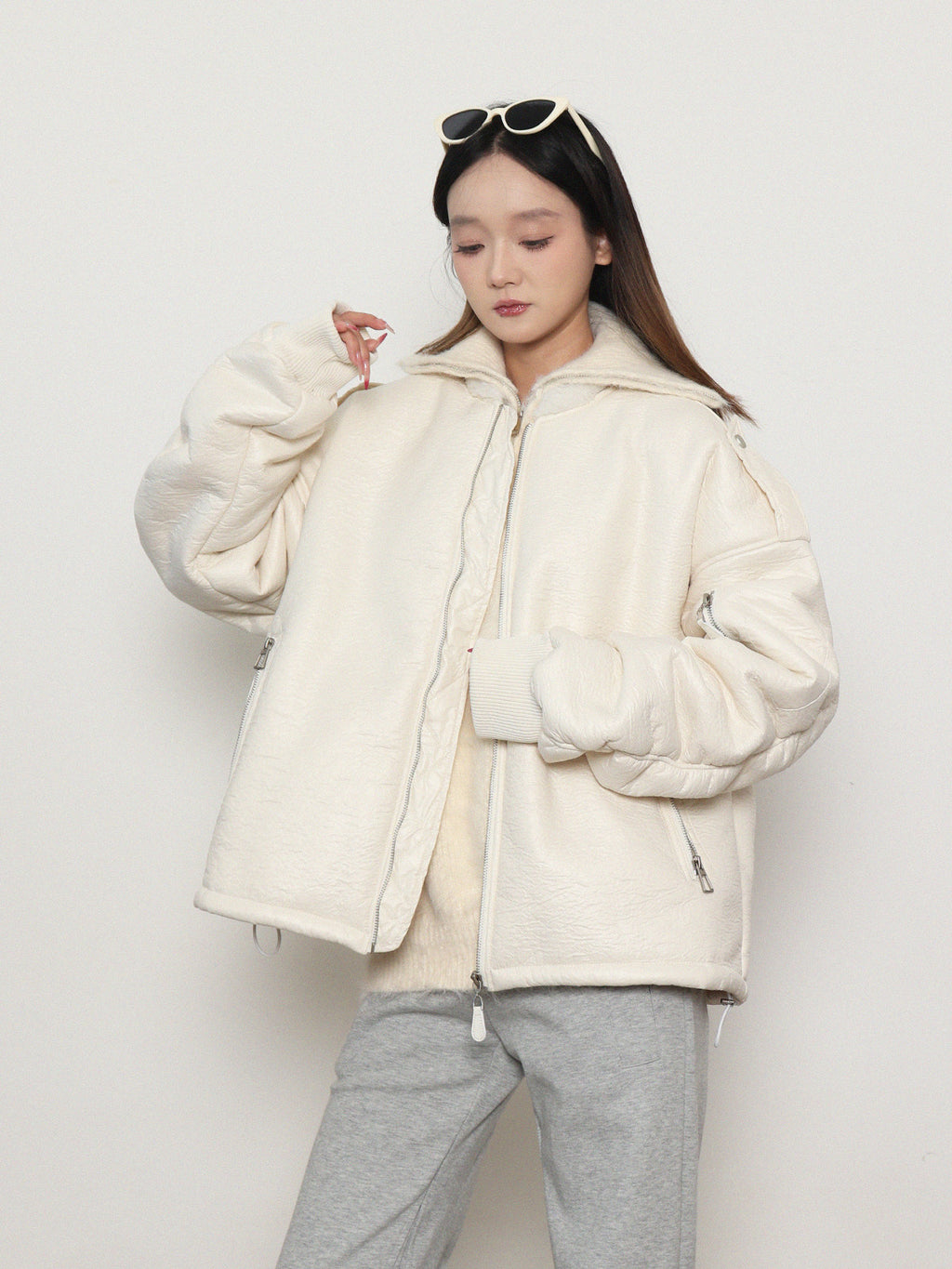 Loose, gender-neutral, warm padded jacket with zipper
