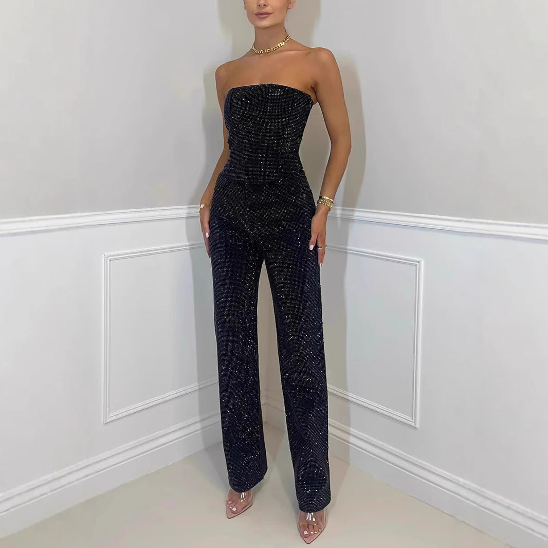 Off-the-shoulder shiny vest and diamond trousers