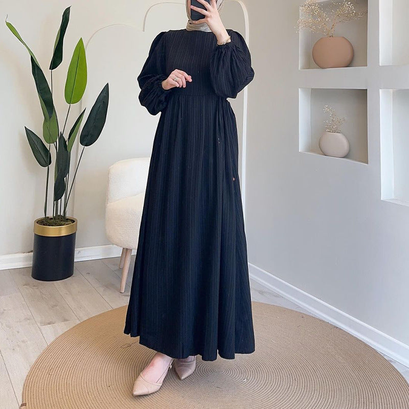Round-necked long robe with frilled sleeves