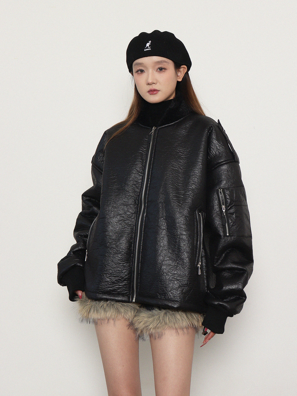 Loose, gender-neutral, warm padded jacket with zipper