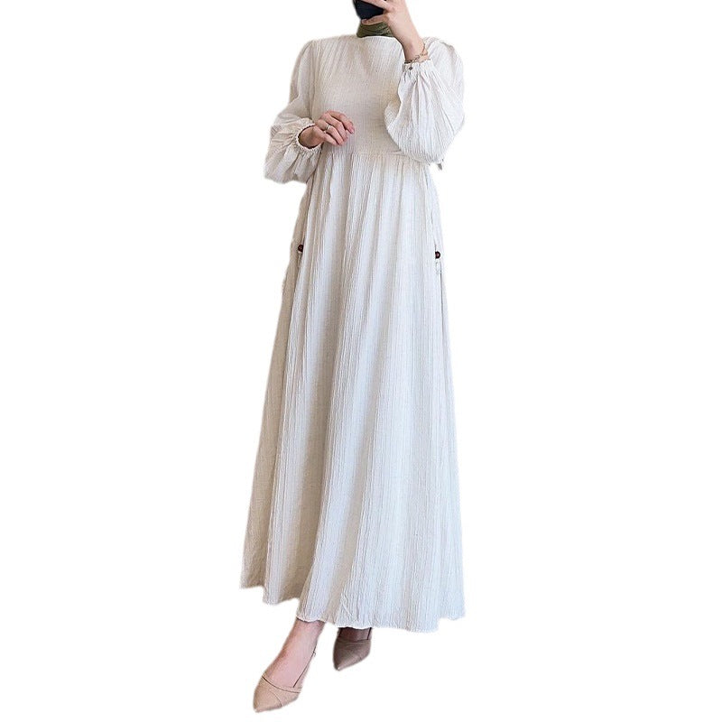 Round-necked long robe with frilled sleeves
