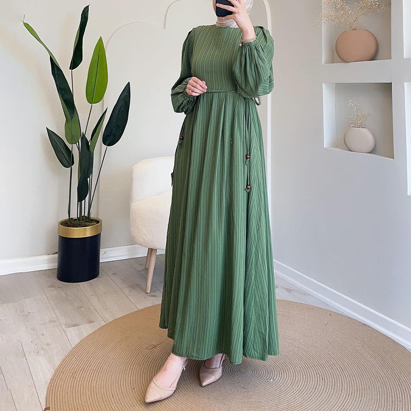 Round-necked long robe with frilled sleeves