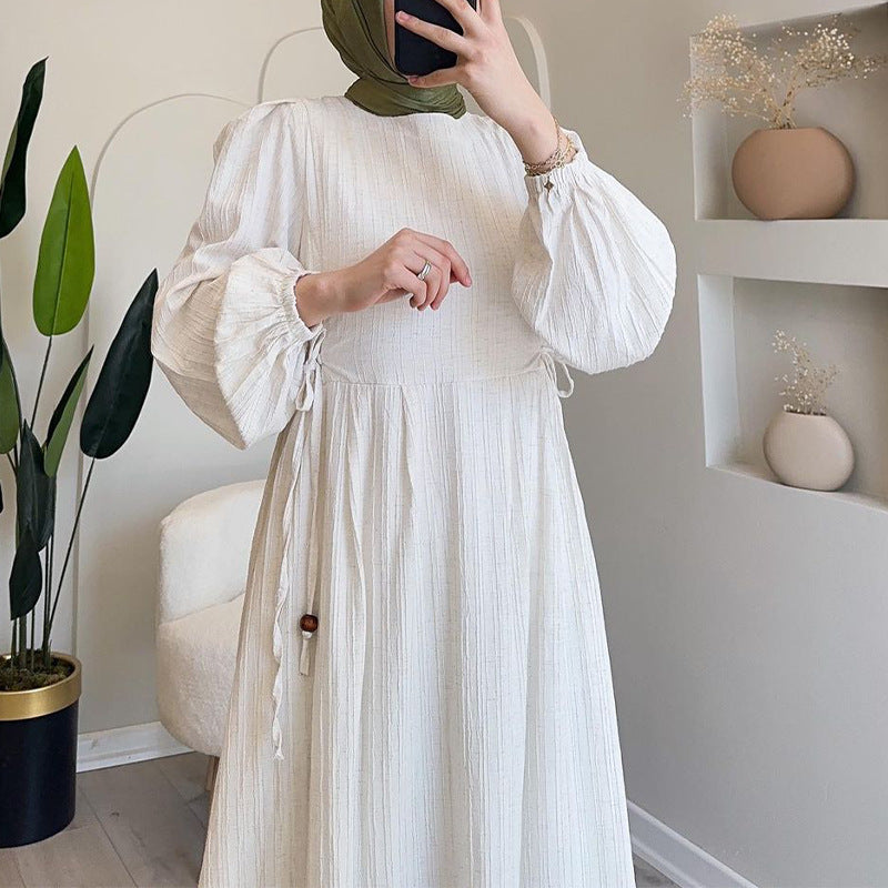 Round-necked long robe with frilled sleeves