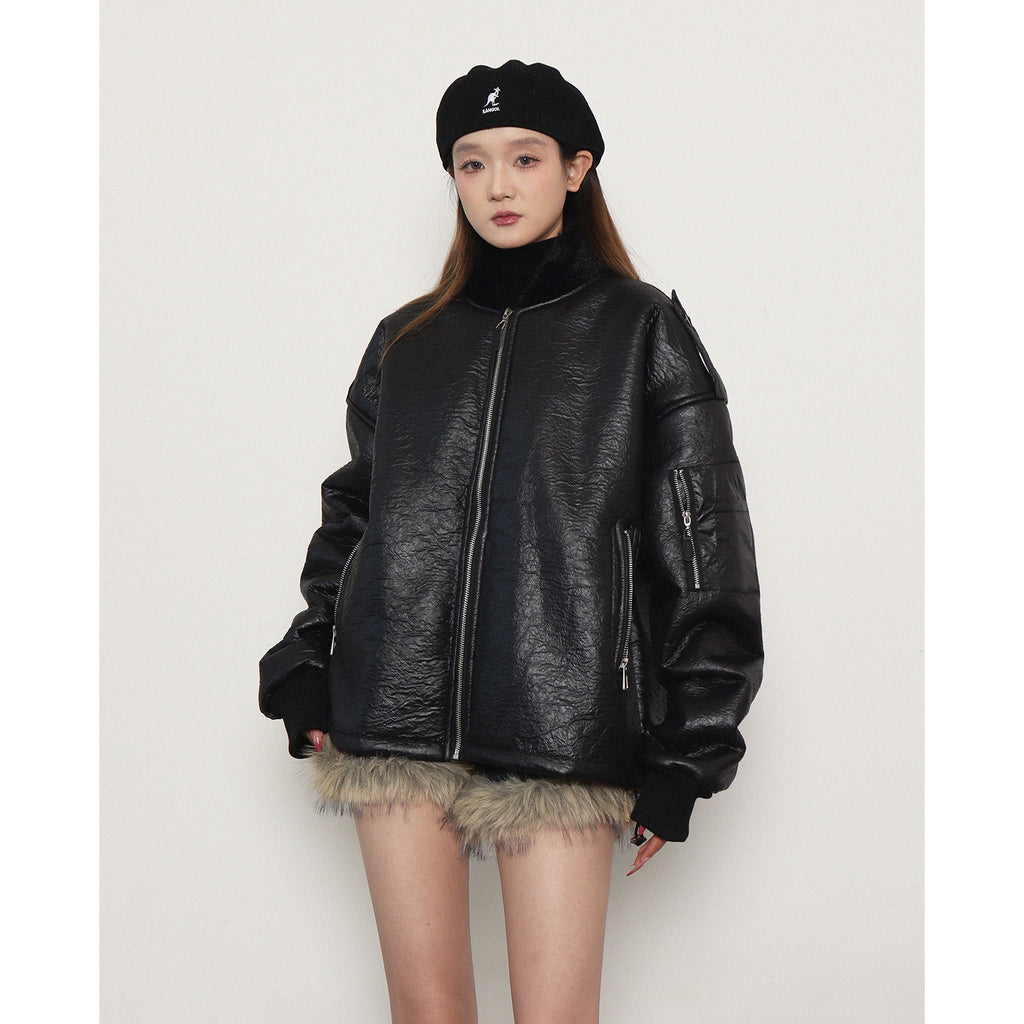 Loose, gender-neutral, warm padded jacket with zipper